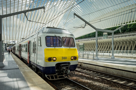 Train in the modern train station of Liege in June 2020.