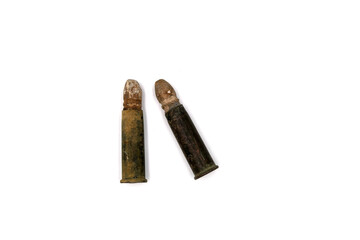 vintage rifle cartridges with lead bullet on white background