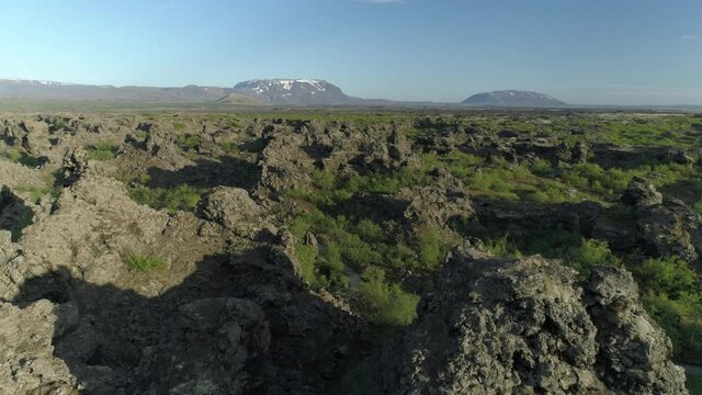 Flying through rugged volcanic terrain Dimmu Borgir Iceland revealing aerial