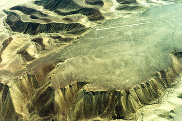 Peru,  landscape and the famous Nazca lines seen from an airplane