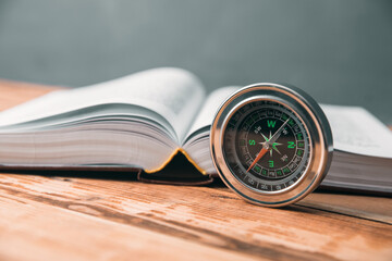 compass and book