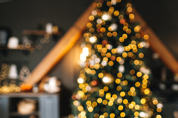 Blurred background with Beautiful Christmas tree and warmth lights. 