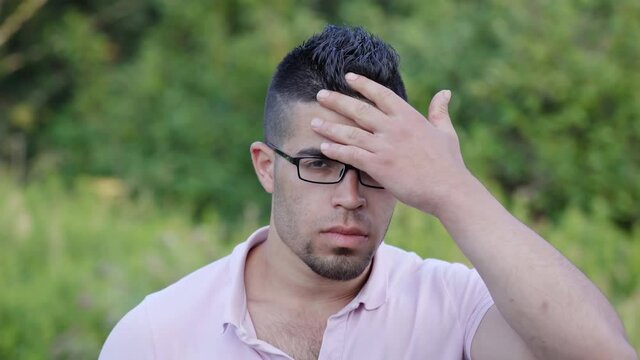 Portrait of a young Jordanian guy with glasses.