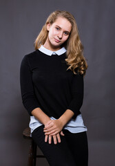 Studio portrait of young beautiful longhaired woman