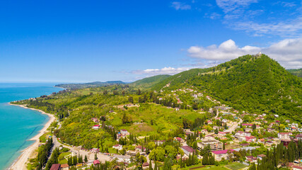 View from drone on Black sea coastal town New Athos and Anakopia mountain