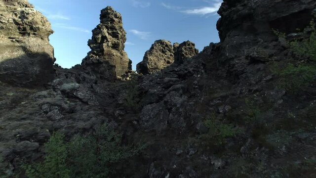 Flying through lava field pillars Dimmu Borgir Iceland aerial