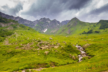 Fototapeta na wymiar Beautiful mountain landscape at Caucasus mountains with clouds
