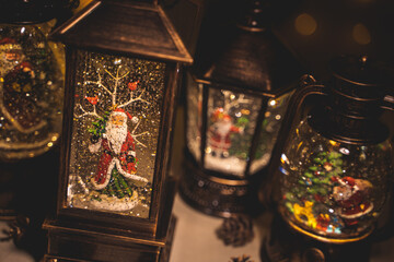 Christmas fairy lanterns with snowfall effect and with figures inside