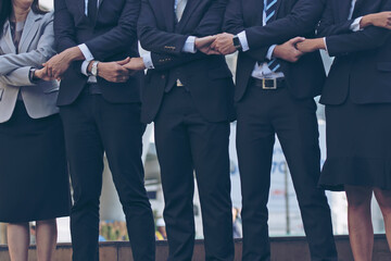 Closeup Businessman And businessmen holding hands