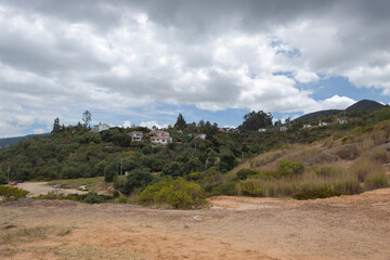Guatavita colombian Town rural scene with green forest and mountains at cloudy day morning
