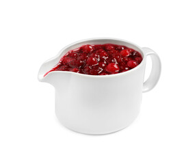 Cranberry sauce in pitcher isolated on white