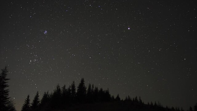 Timelapse starry sky and starfall in the carpathian mountains. High quality 4k footage