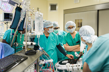 Doctors discuss the details of the operation