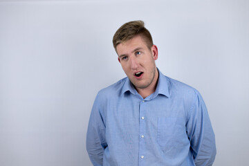 Business young man wearing a casual shirt over white background afraid and shocked with surprise and amazed expression, fear and excited face.