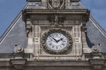 Architectural fragments of XIX arrondissement City hall (inscription: Mairie du XIX Arr, 1878) in Paris. XIX arrondissement called Butte-Chaumont, situated on right bank of River Seine. Paris, France.