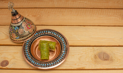 Closeup of traditional Turkish dessert - baklava (this kind of baklava call Saray sarma). Most popular in Ramadan time (Turkish: Ramazan bayrami).  Top view