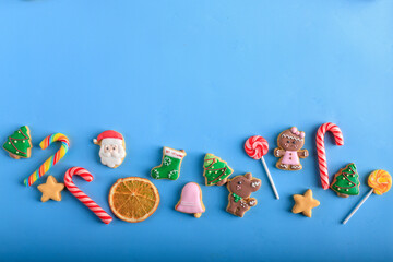 Christmas Concept with Layout Decorated Icing Sugar Cookies Composition. Copy Space for Text