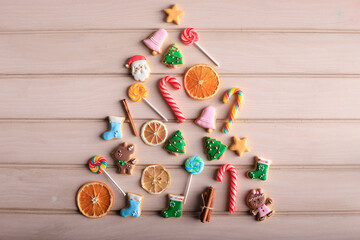 Christmas Concept with Layout Decorated Icing Sugar Cookies Composition. Copy Space for Text