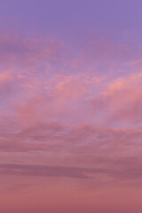 Naklejka na ściany i meble Soft sunrise, sunset pink violet sky with clouds background texture