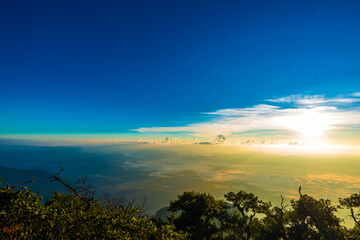 Mountain sunrise visible silhouettes through the morning