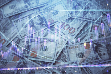Double exposure of forex graph drawing over us dollars bill background. Concept of financial markets.