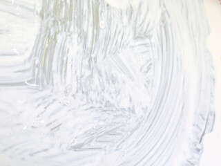 The white marks from the paint brush on the wall are suitable for background and presentation (focus selection).