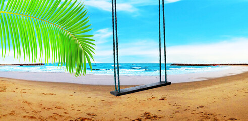 Coconut leaves, seat, rope hangers, and beautiful ocean views, perfect for background and presentation(focus selection).