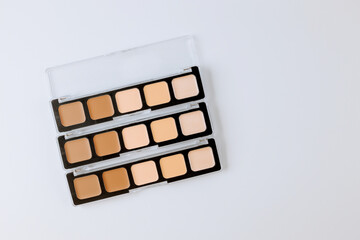 Set of makeup eyeshadow palette cosmetics for eyes isolated over white background