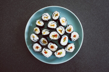 plant-based food, homemade vegan sushi with stir fried vegetable filling