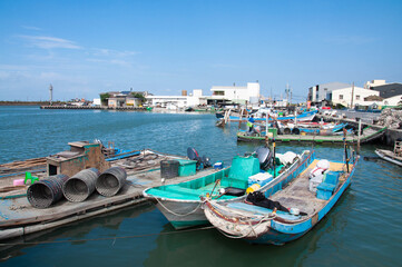 Fototapeta na wymiar Fishing boats moored in port. Taiwan. 