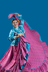 Obraz premium mexican latin woman with traditional folk costume with multicolored background, dancer and mexican model posing traditional folk clothing