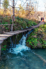 Wooden path and waterfall in Plitvice lakes National park, Croatia