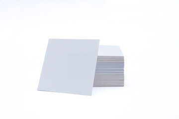 Mockup of white business cards stack isolated on white background. Mock-up and template for branding identity.