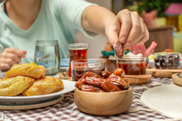 Middle Eastern traditional breakfast during Ramadan fasting (aka: Sahur or Suhoor). Date fruit for dinner or iftar.  Ramadan background. Ramadan kareem.