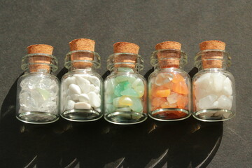 A beautiful little jewel that shines in a small vial
