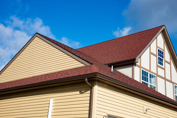Fototapeta premium Close up view on asphalt roofing shingles