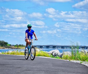 woman riding a bike at the park