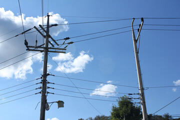 electric pole with blue sky background