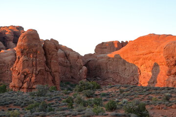 Fototapeta premium South Window Arch rocks at sunset, Arches National Park