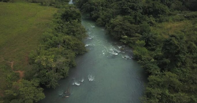 Drone aerial flying over beautiful river Cahabon in Guatemala, Central america