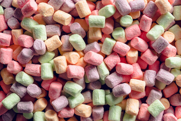 Background with colorful marshmallows. Background and texture. Shot from above.