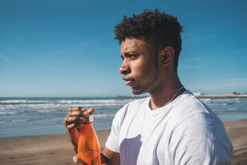 Athletic man with a bottle of water.