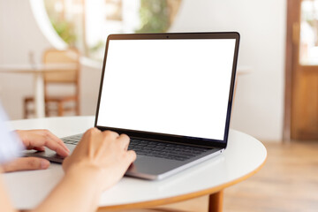 computer screen blank mockup.hand woman work using laptop with white background for advertising,contact business search information on desk at coffee shop.marketing and creative design