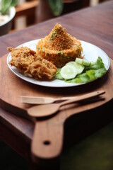 Indonesia Traditional Spicy Fried Rice with fried chicken