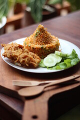 Indonesia Traditional Spicy Fried Rice with fried chicken