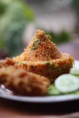 Indonesia Traditional Spicy Fried Rice with fried chicken