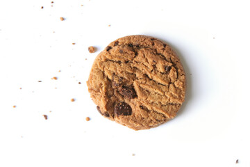 Chocolate chip cookies with crumbs isolated on white background