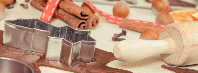 Vintage photo, Cookie cutters, rolling pin and dough for Christmas cookies or gingerbread