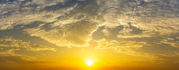 Dramatic golden sunrise and cloud sky nature panorama background