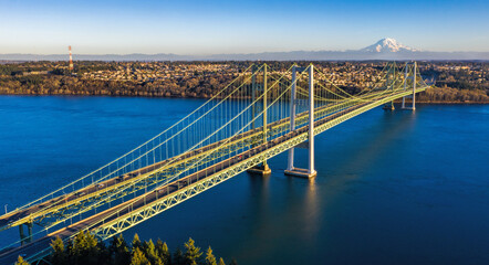 Tacoma Narrows Bridge in Washington State taken from the Gig Harbor side with Mt Rainier in the...